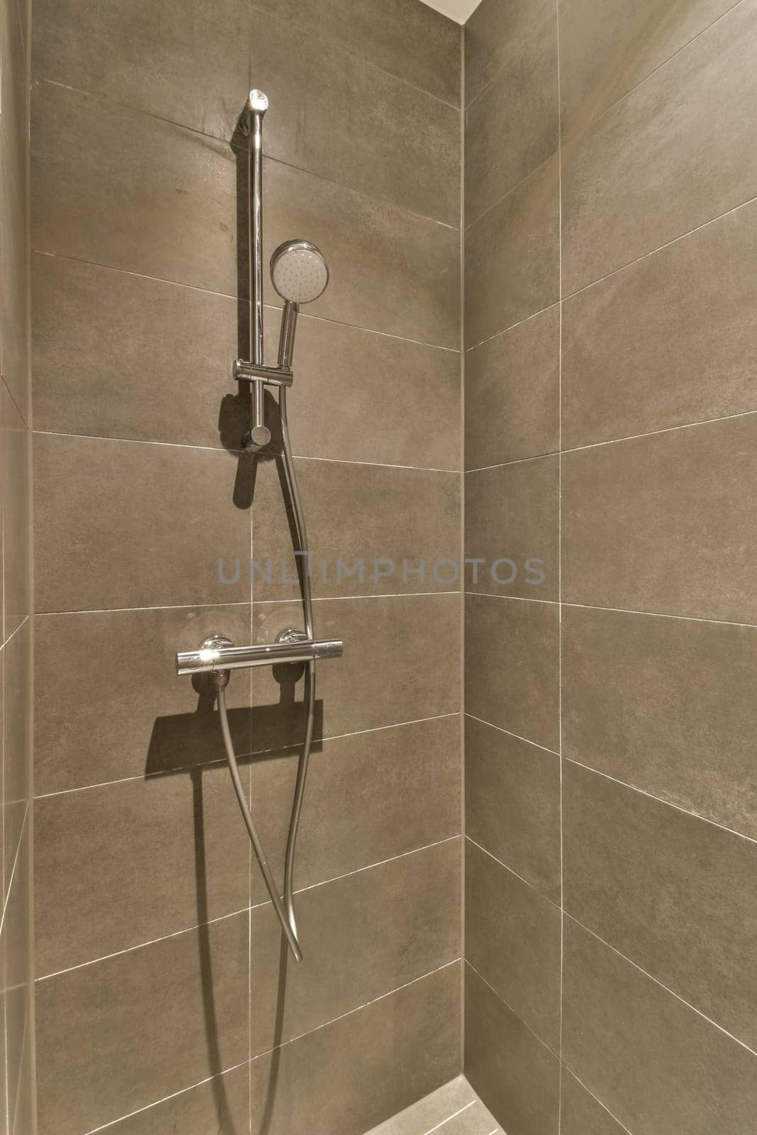 a shower that is very clean and ready to be used for use in the bathroom or as an additional room