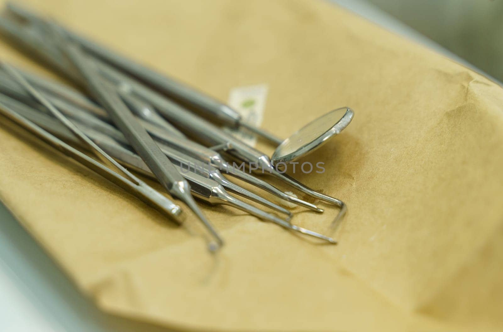 Dental instruments lie on wrapping paper before use. by Sd28DimoN_1976