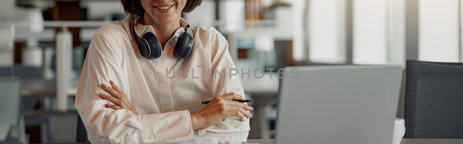 Attractive european business woman working laptop while sitting in cozy cafe and looking camera by Yaroslav_astakhov