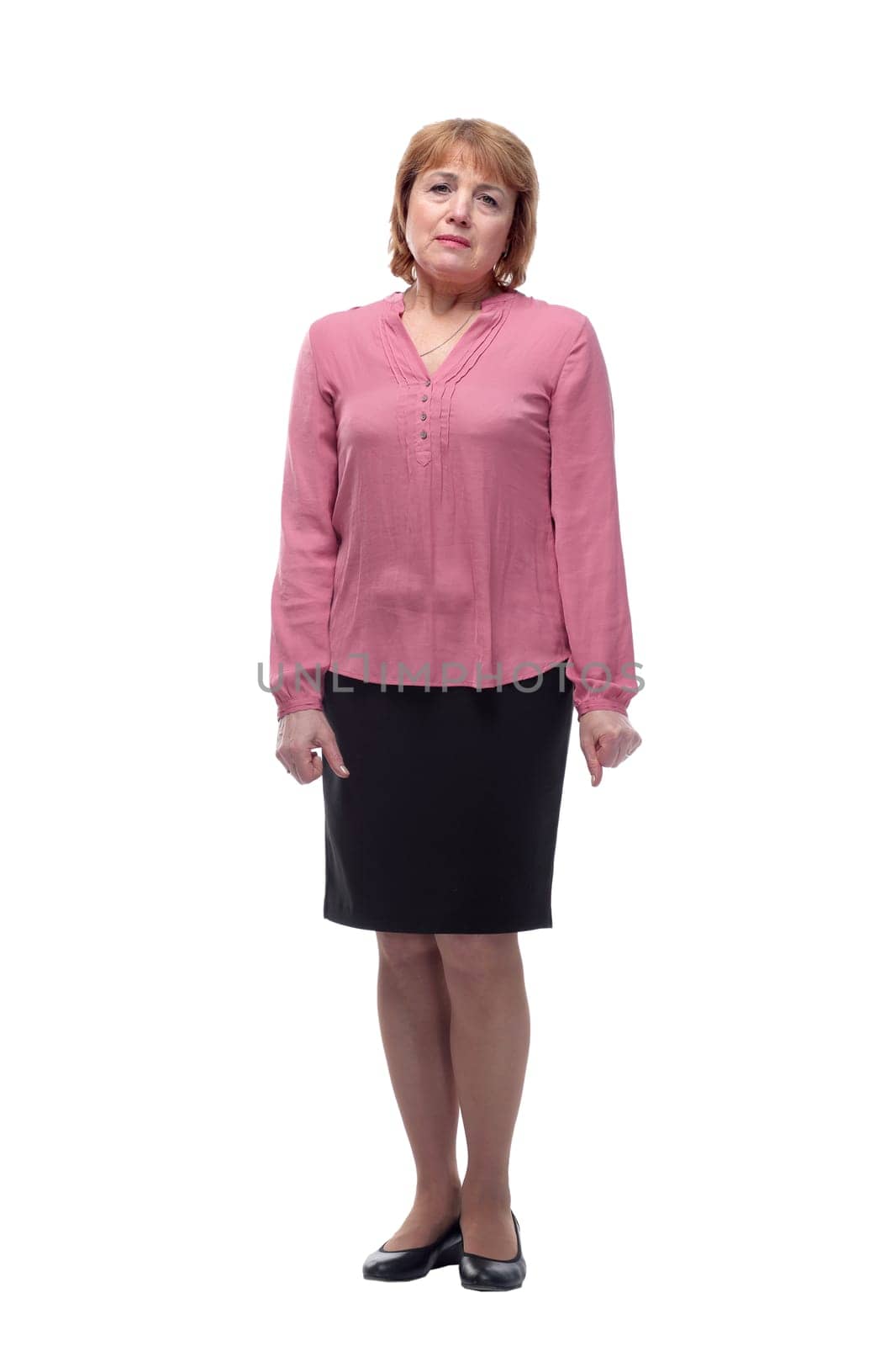 A color portrait photo of a pensive and depressed looking mature woman isolated on white