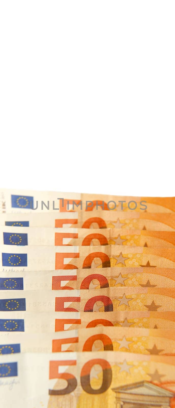 Banknotes with a face value of 50 euros are large with a white background on top. Copy space. Paper cash euro banknotes.