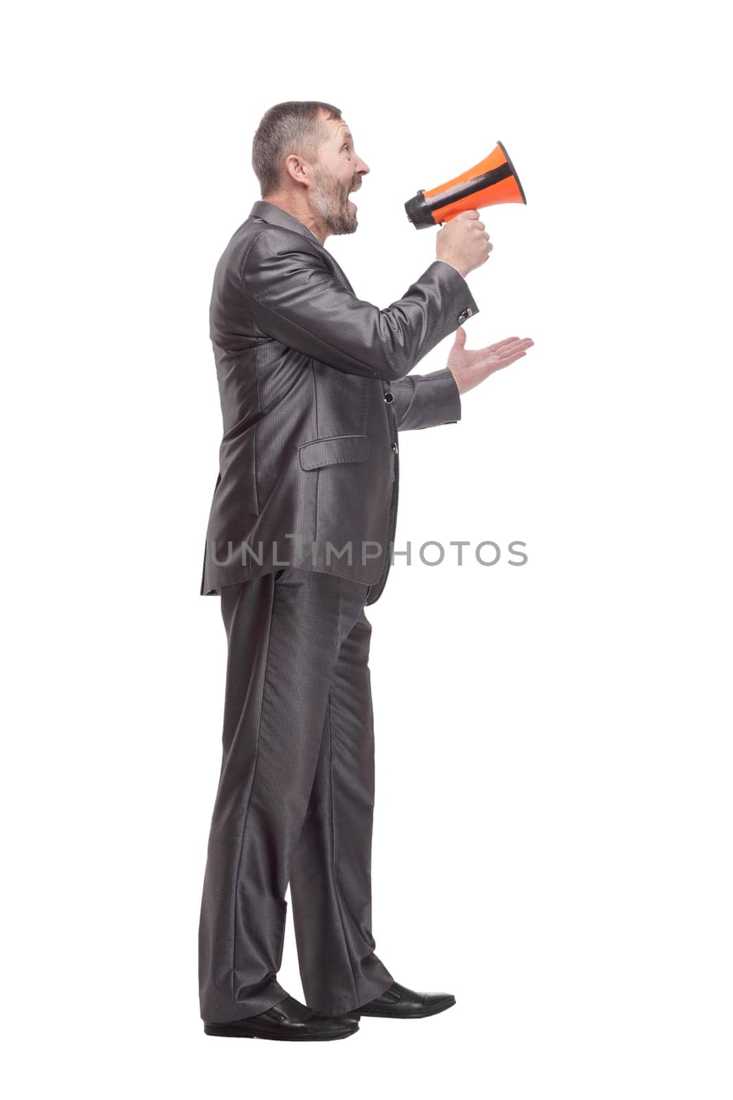 full-length. business man with a megaphone. isolated on a white background.