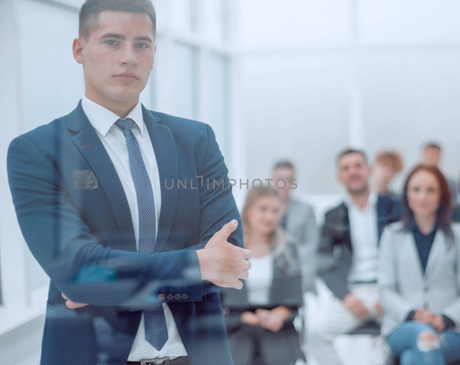 speaker is asking a question during a business seminar. by asdf