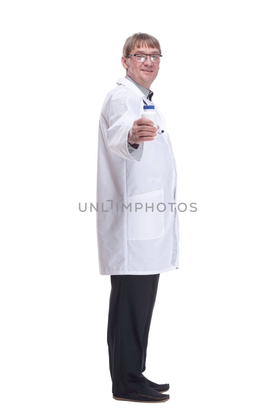 side view. doctor expert handing you a bottle of antiseptic. isolated on a white background.