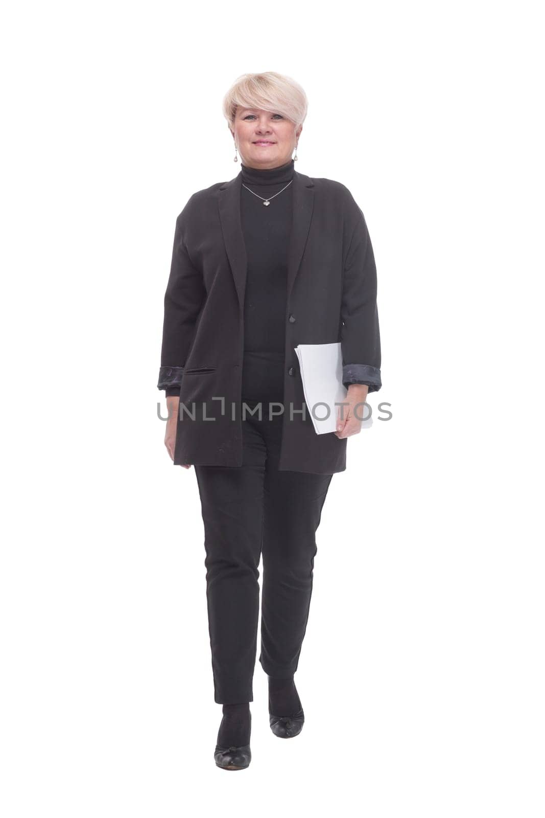 in full growth. business woman with a stack of business documents. isolated on a white background.
