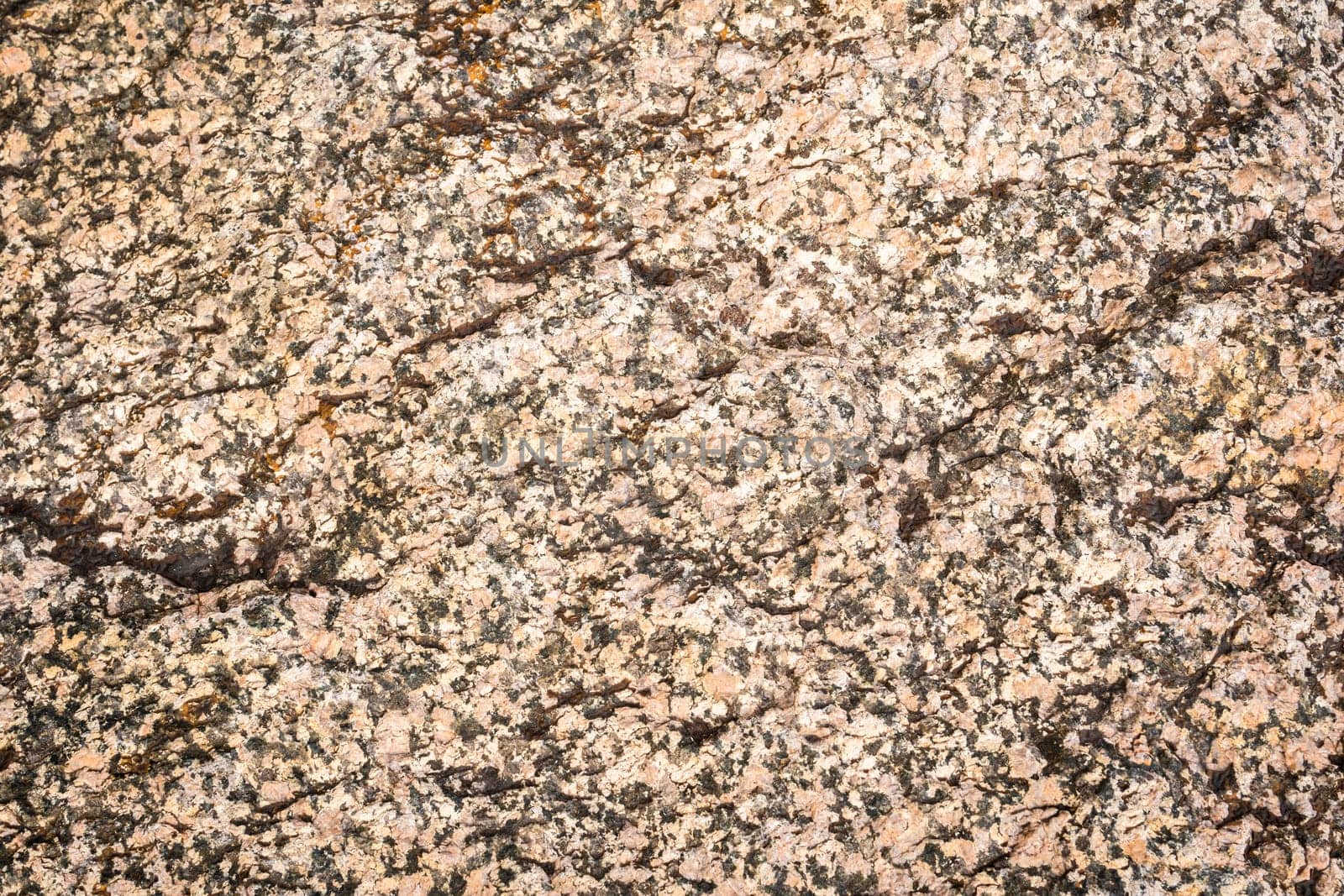 Marble wall stone texture, close-up of the rock surface.