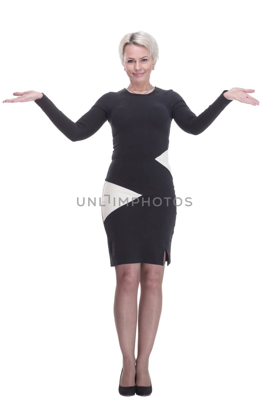 in full growth.elegant fashionable woman greeting you. isolated on white background.