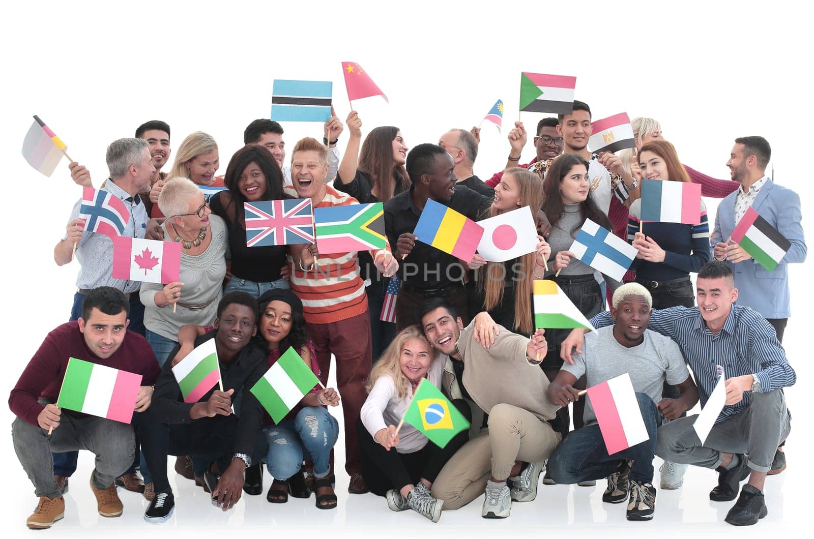 Happy people holding country flags in their hands.The international cooperation concept