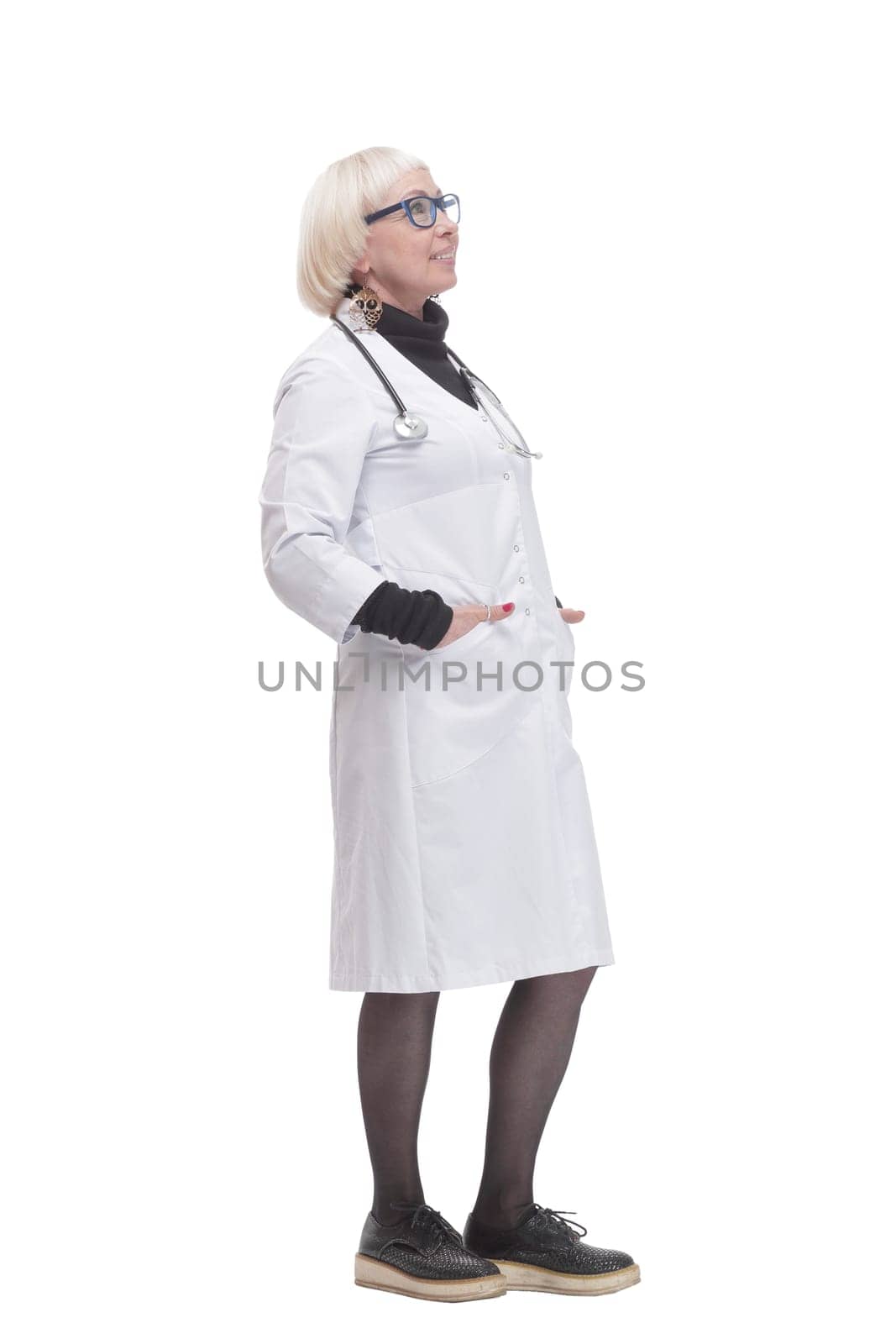 in full growth. friendly woman doctor. isolated on a white background.