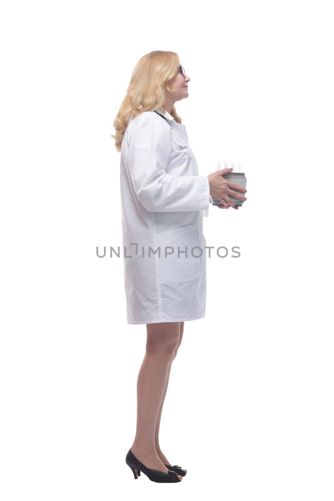 side view. smiling woman lab assistant with laboratory tests. isolated on a white background.