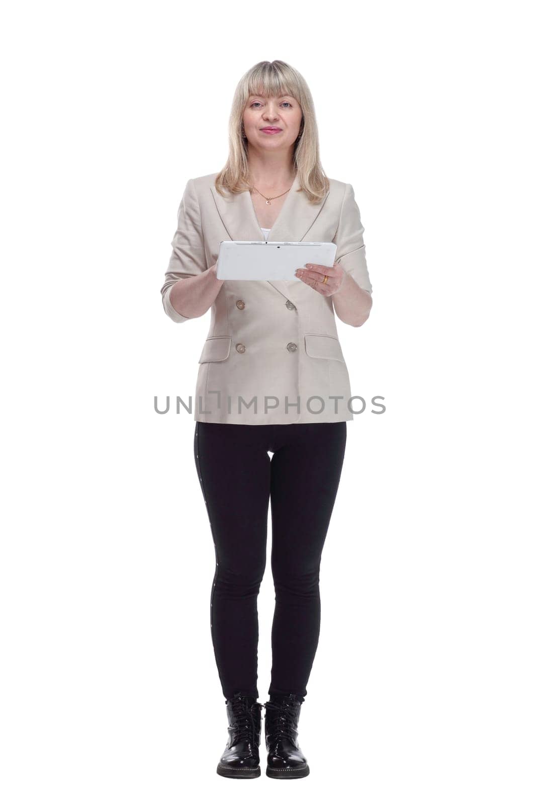 in full growth. Mature blonde woman with digital tablet . isolated on a white background.