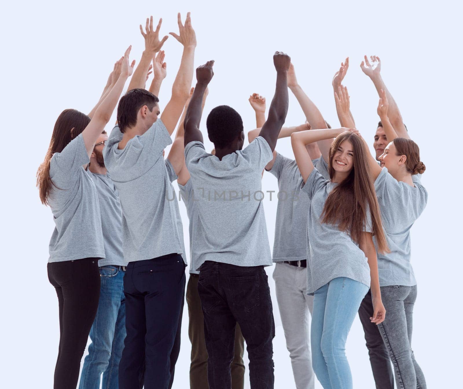 in full growth. smiling girl standing in a circle with her friends. photo with copy space