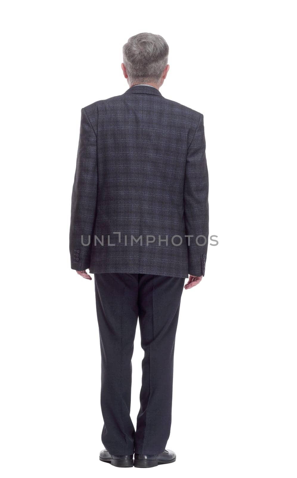 rear view. adult casual male reading an ad on a white screen . isolated on a white
