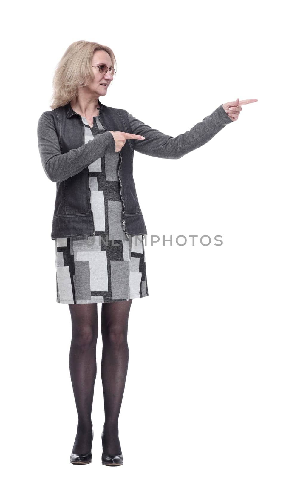 in full growth. glad young woman looking at you . isolated on a white background