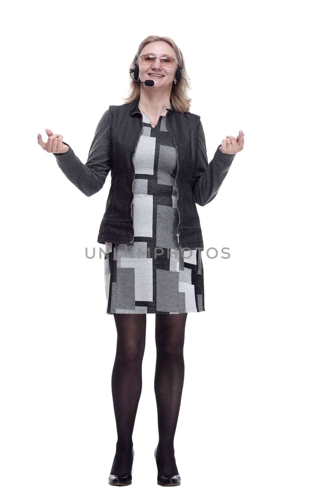in full growth. young woman in a headset . isolated on a white background