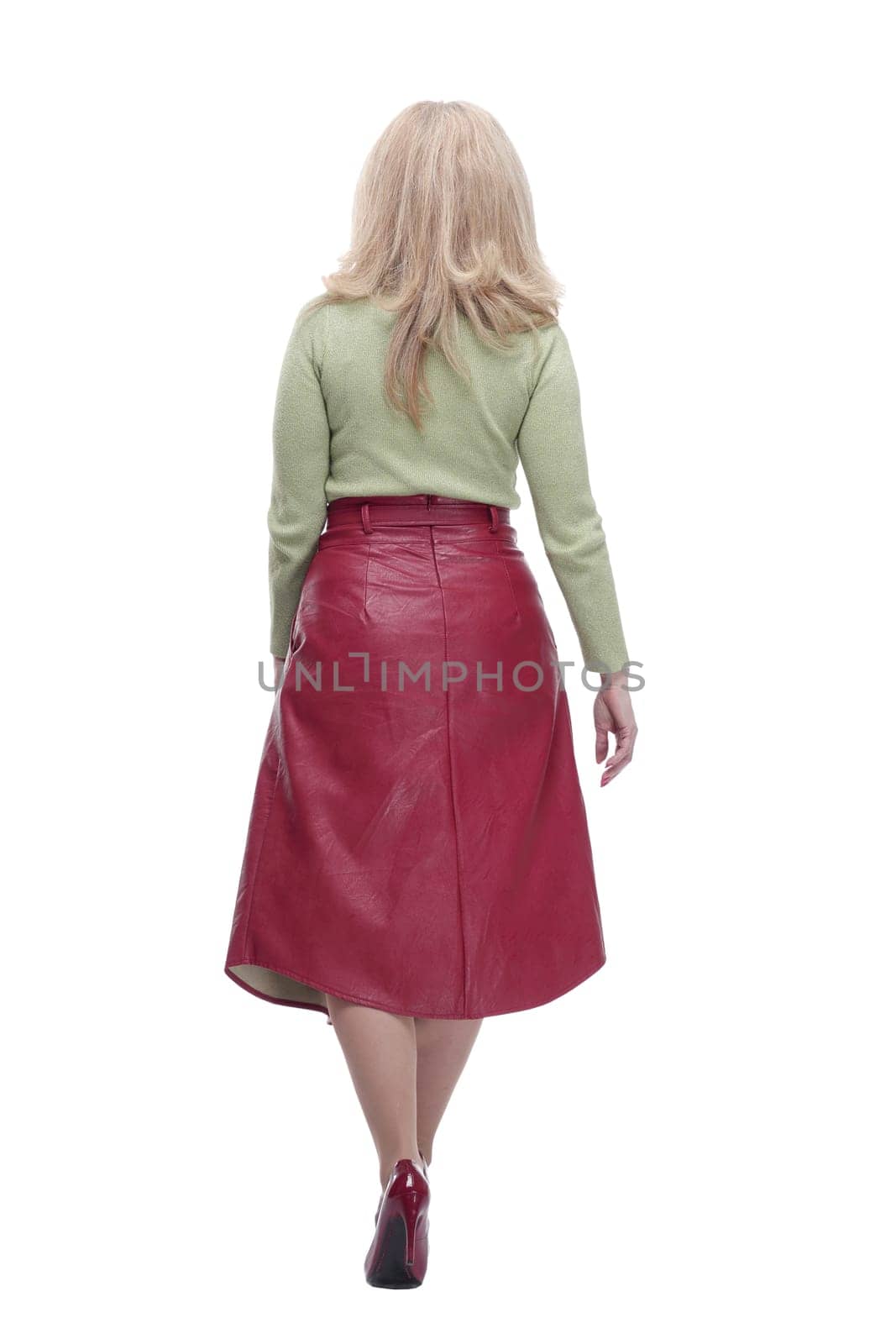 rear view. a blonde woman looking at a white screen. isolated on a white background