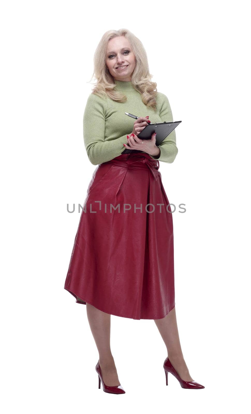 in full growth. attractive young woman with clipboard. isolated on a white background