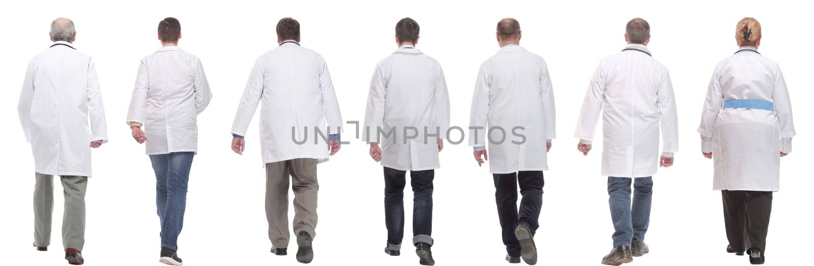 group of doctors in motion isolated on white background