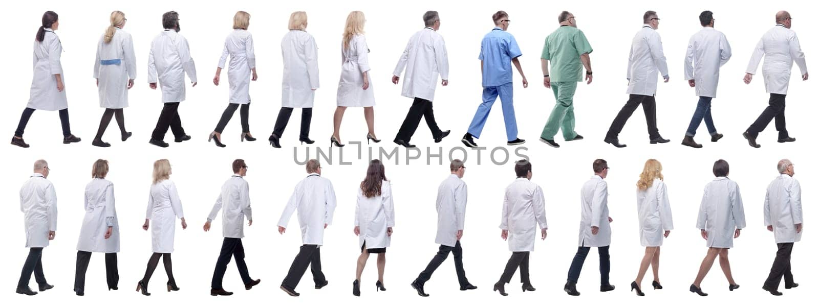 group of doctors in motion isolated on white background