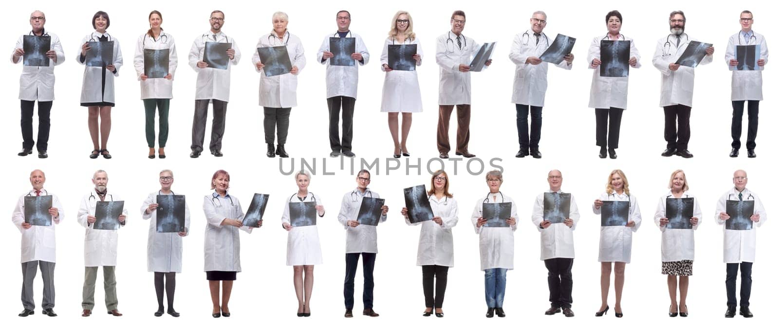 group of doctors holding x-ray isolated on white by asdf