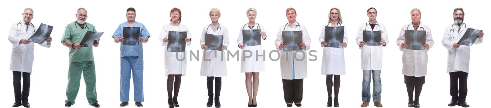 group of doctors holding x-ray isolated on white by asdf