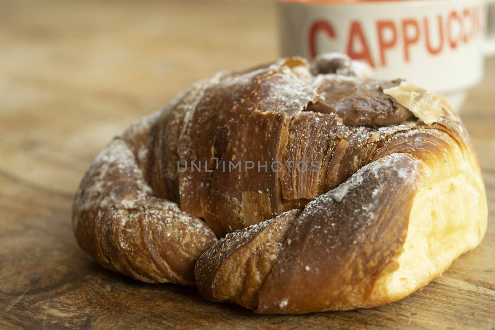 good awakening with hot freshly baked croissant and cappuccino