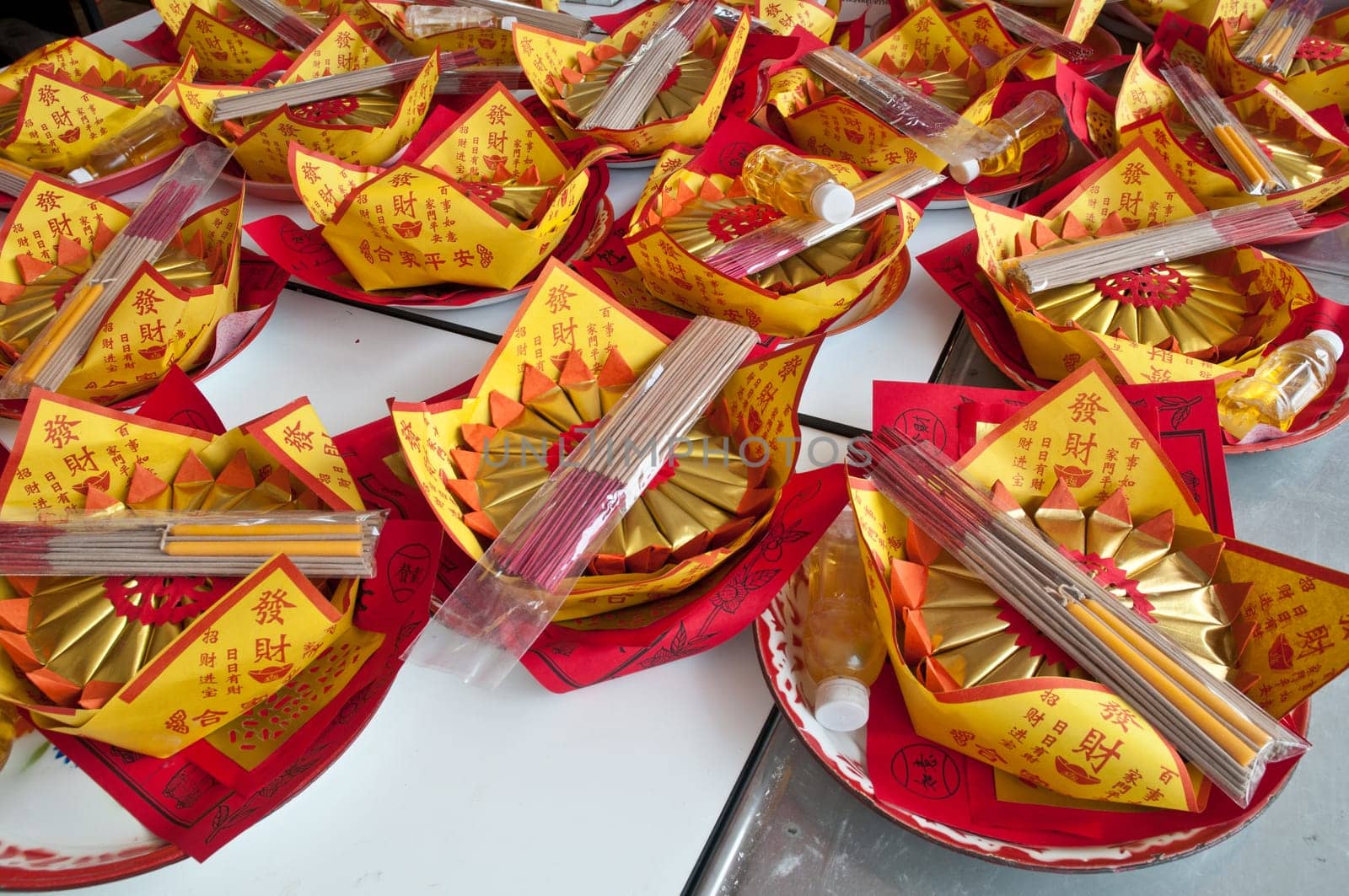 Lucky paper wishing lantern with Chinese poems and incense sticks to pray for god in Asia