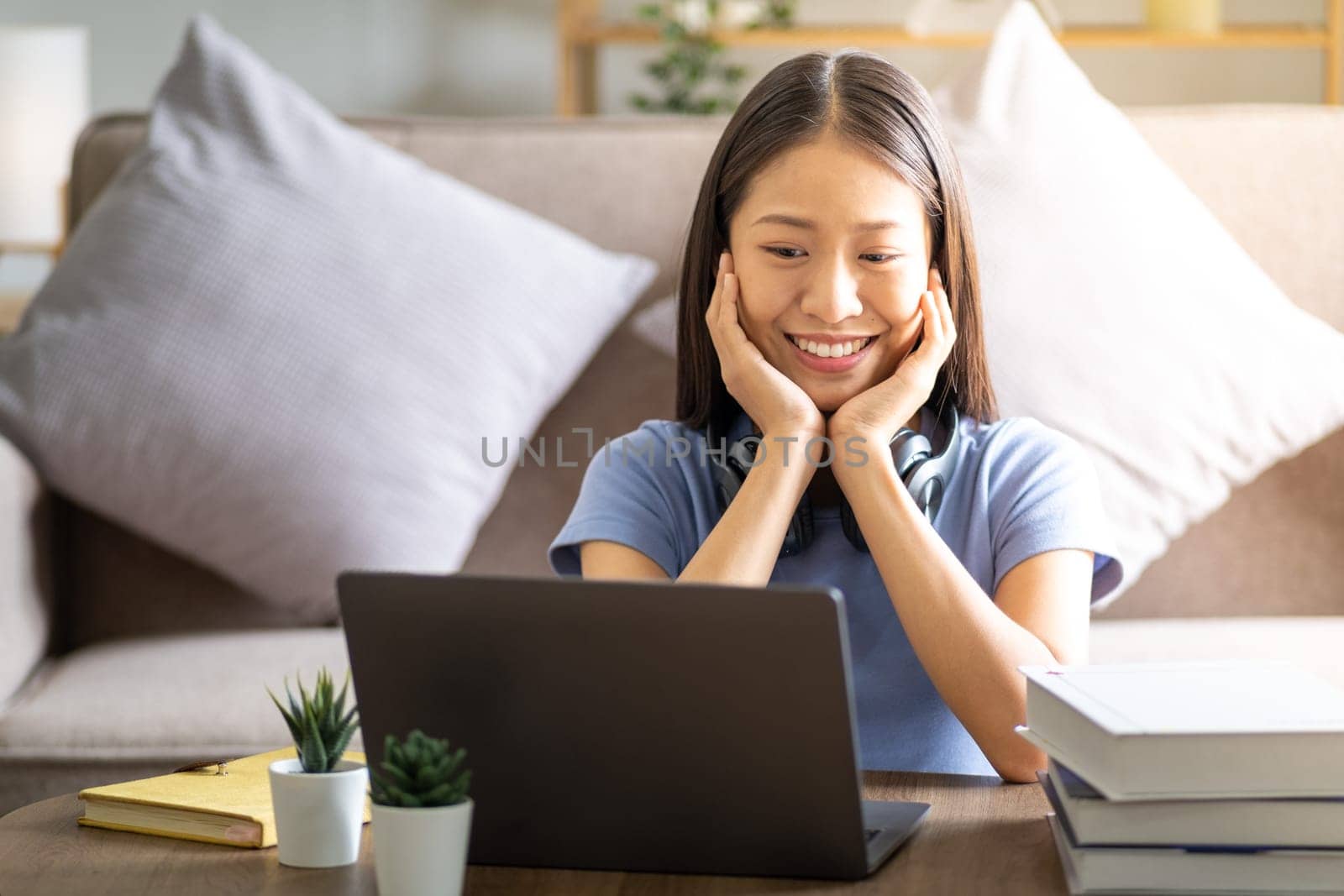 happy young cute teenager beautiful woman casual life sitting on couch at home, by wuttichaicci