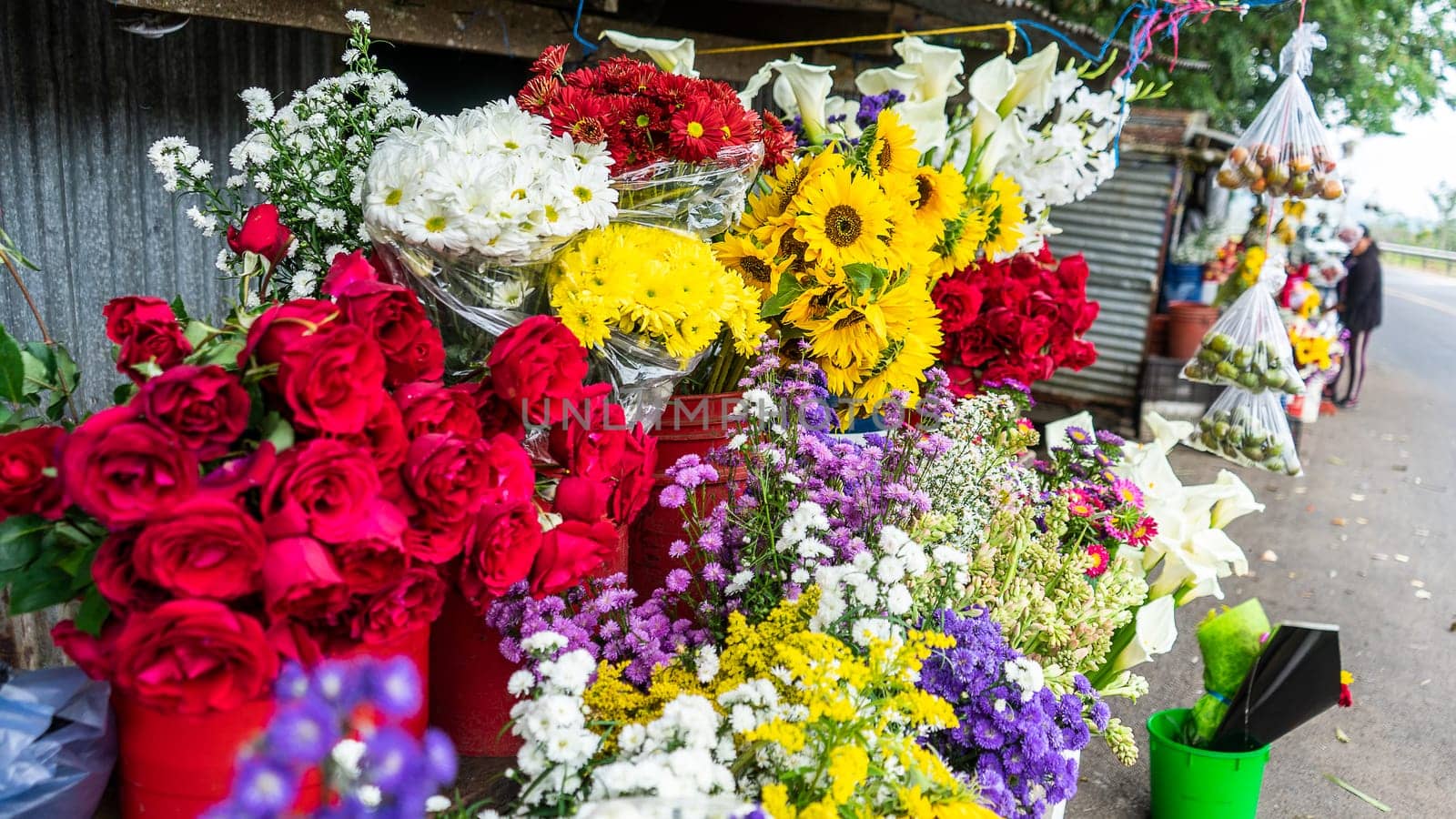 Small stall selling natural flowers on a road to Jinotega, Nicaragua, Central America