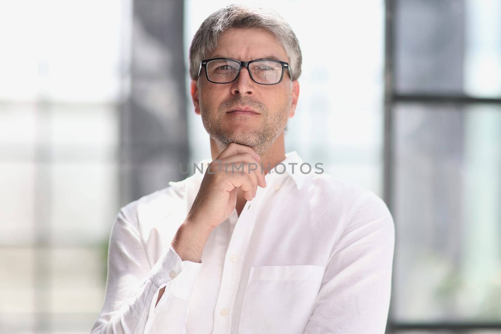 portrait of a successful business man. businessman smiling and looking at camera
