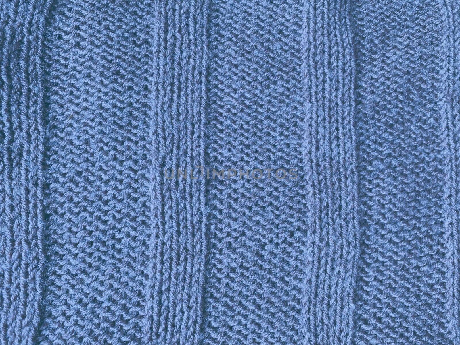 Weave Knitted Blanket. Organic Wool Design. Knitwear Holiday Background. Detail Knitted Blanket. Blue Macro Thread. Nordic Xmas Carpet. Soft Yarn Embroidery. Knitted Sweater.