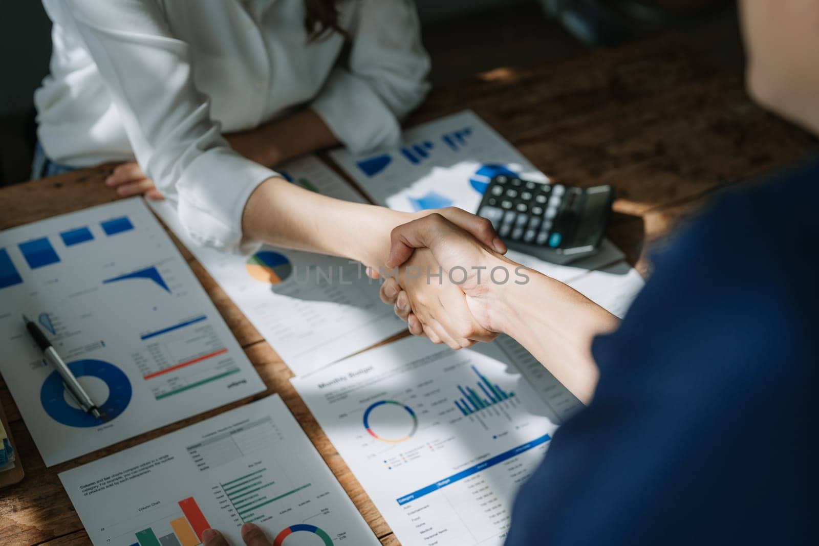 Handshake, contract deal and business partnership of meeting with shaking hands. Networking, hiring and professional negotiation of onboarding collaboration and congratulations of project by Manastrong