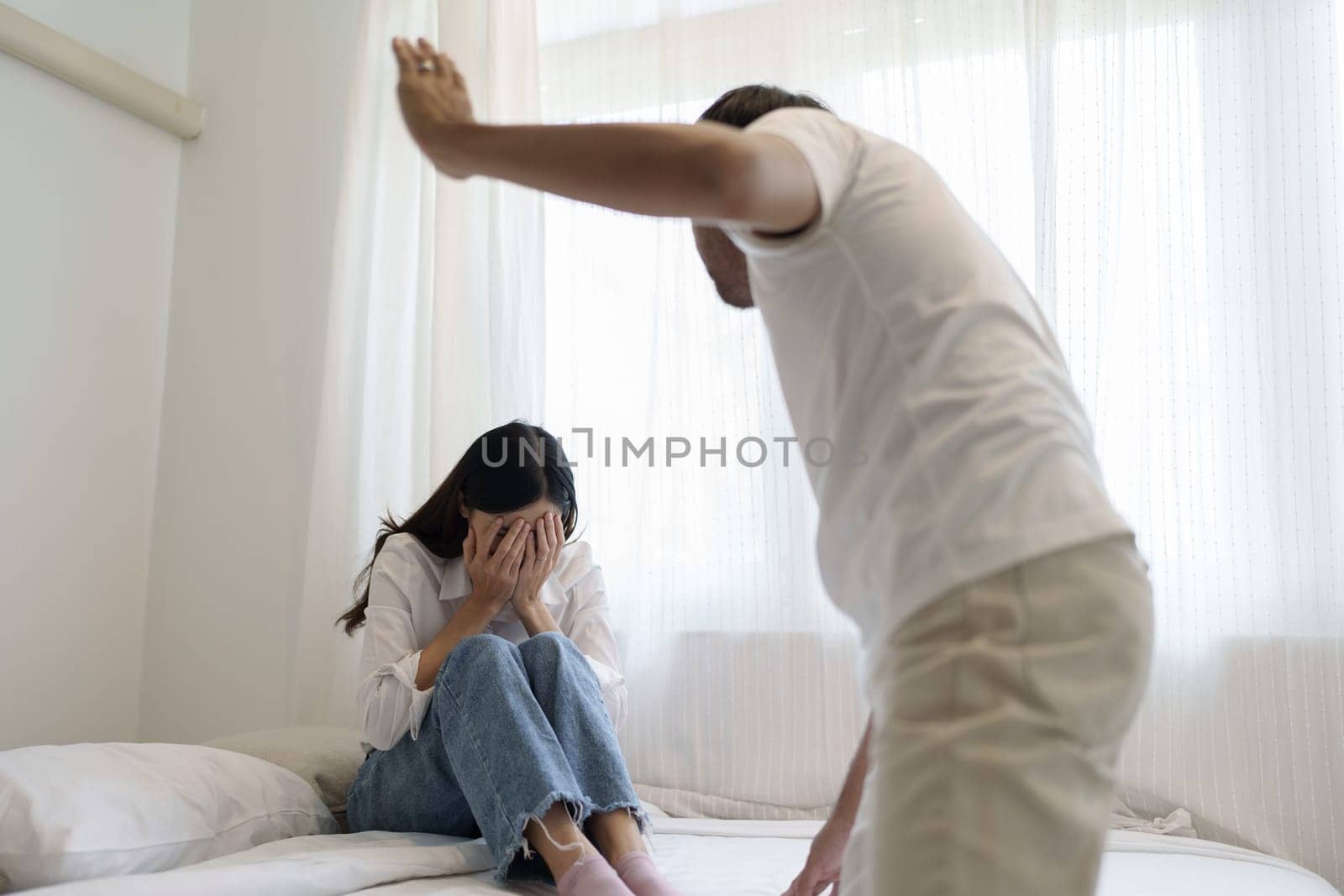 Domestic violence and Family conflict concept, father fighting mother with quarrel at home