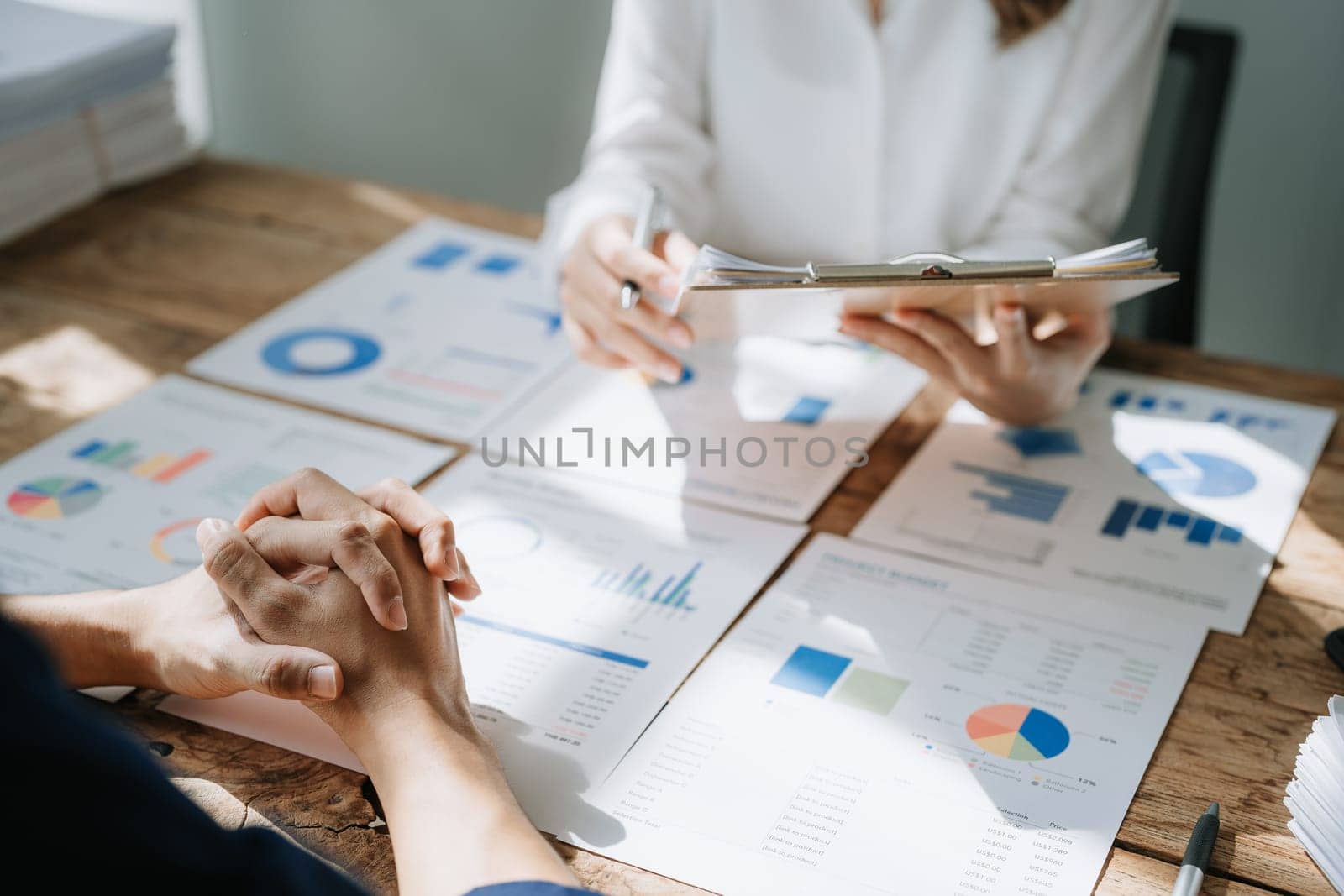 startup business, business advisor leadership for planning finance investment teamwork paperwork audit and discussing marketing, profit, budget of company in meeting room