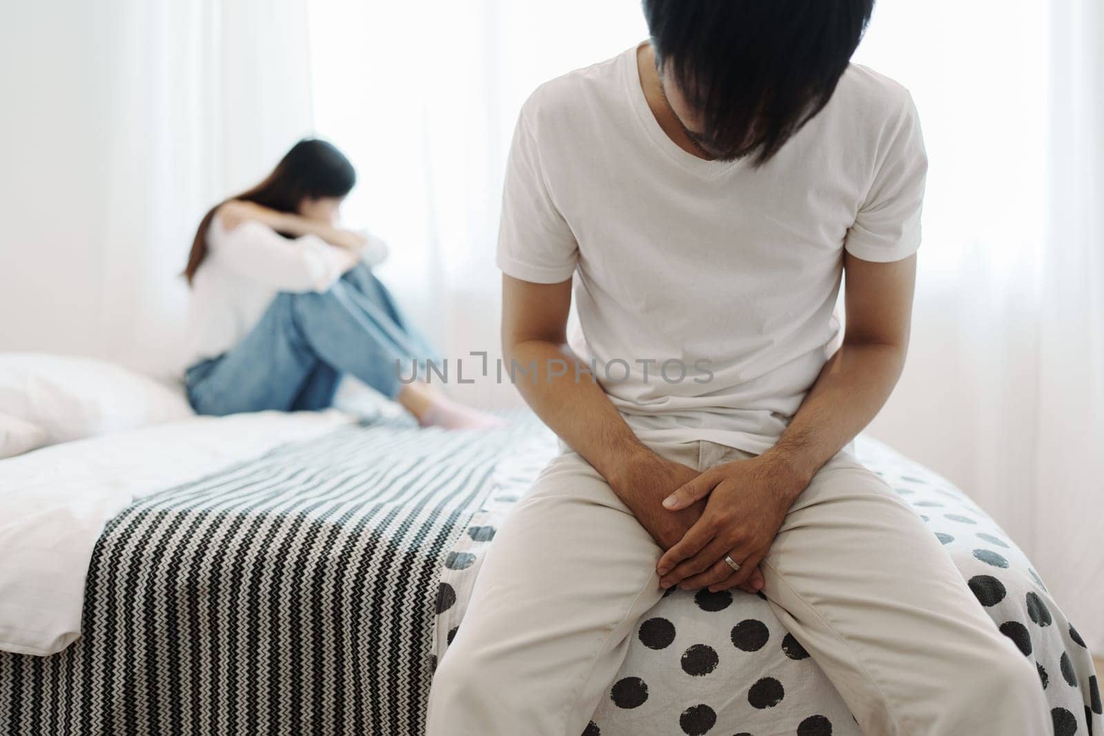 Young couple lying in bed in bedroom at home, woman in lingerie sleeping, sad, frustrated man thinking about relationships, family having sexual problems, erectile dysfunction concepts