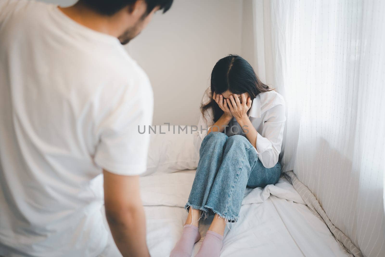 Domestic violence and Family conflict concept, father fighting mother with quarrel at home