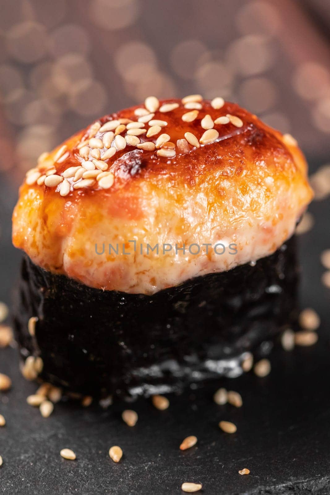 Baked shrimp gunkan on wooden background. Simple gunkan sushi with shrimp tartare with mayonnaise in minimal style. Japanese food - nigiri sushi in nori. Nigiri sushi with fish by Satura86