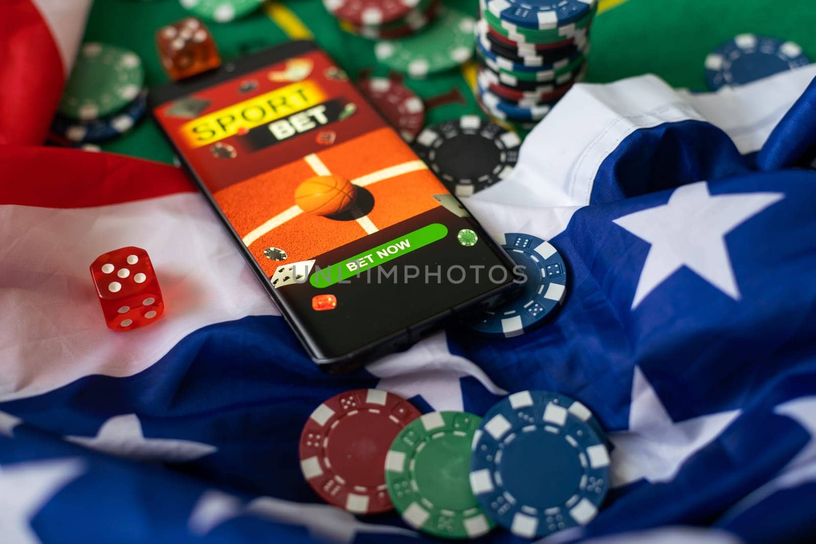 smartphone with sports betting, casino, flag of the USA.