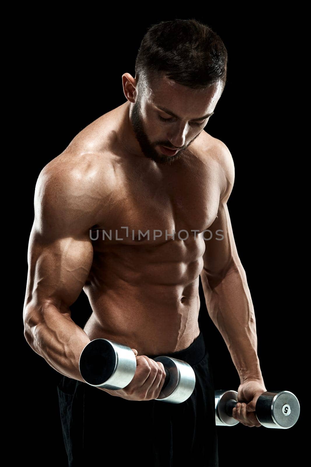 Muscular bodybuilder guy doing posing by nazarovsergey