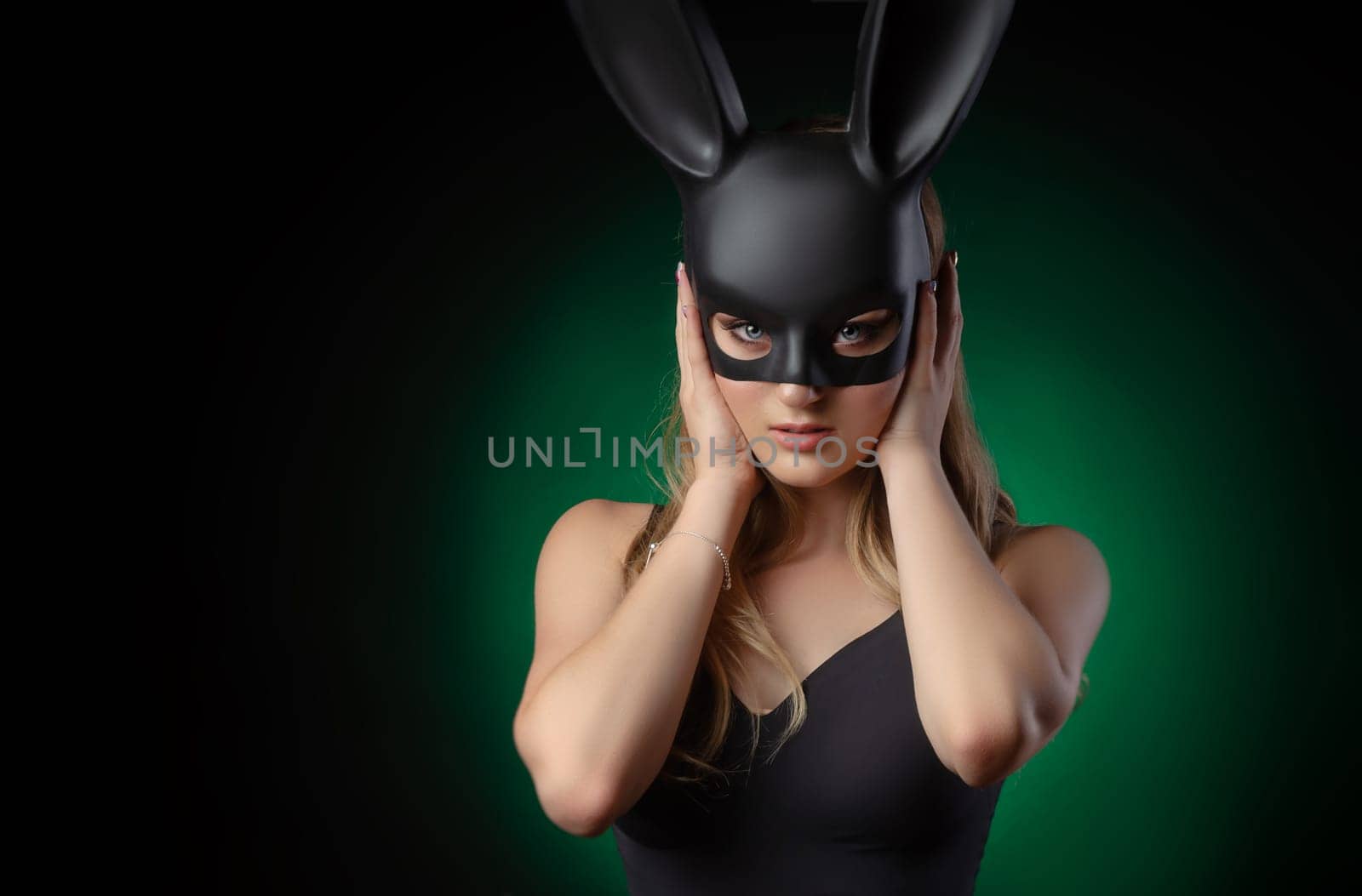 girl in a rabbit mask with beautiful eyes on a dark background by Rotozey