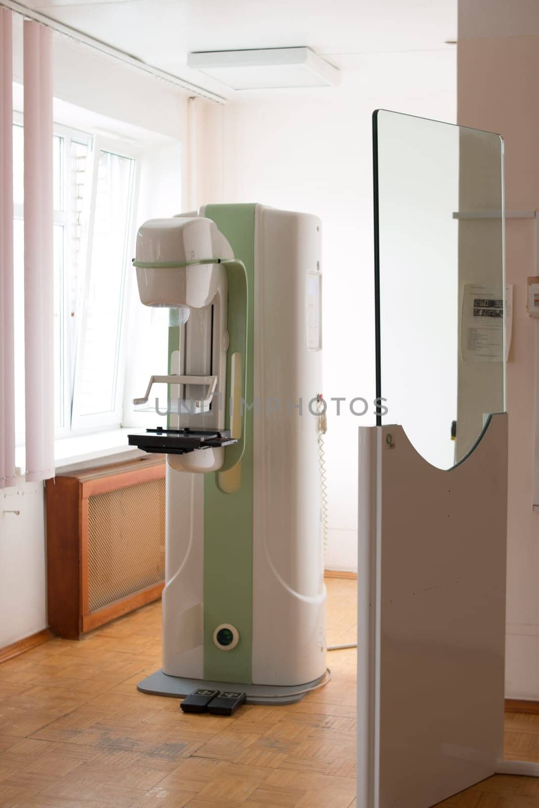 Mammography breast screening device in hospital laboratory of modern clinic. Selective focus