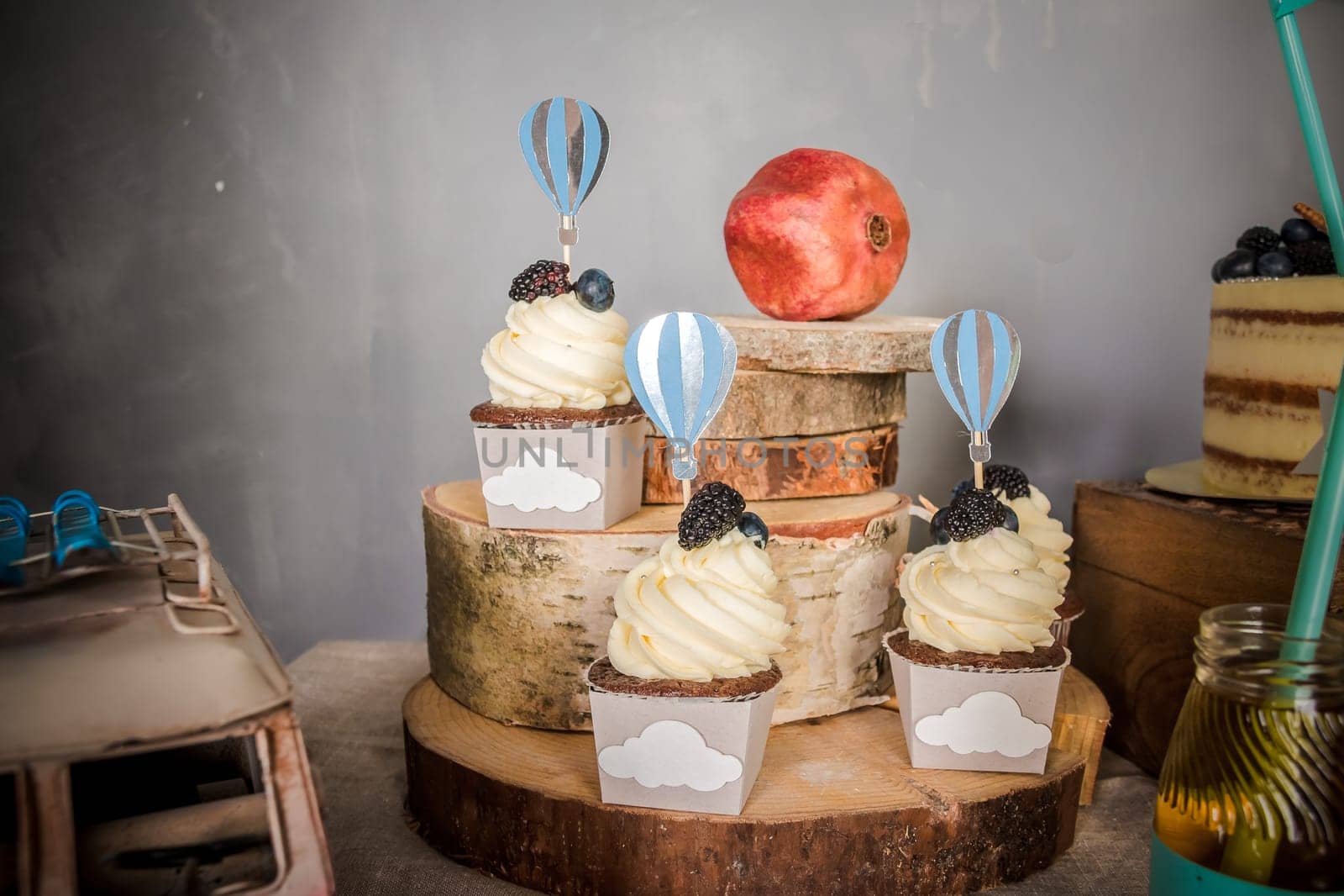 Buffet with sweets. Sweet, colorful cupcakes. Sweet table for banquets, weddings, parties Candy bar
