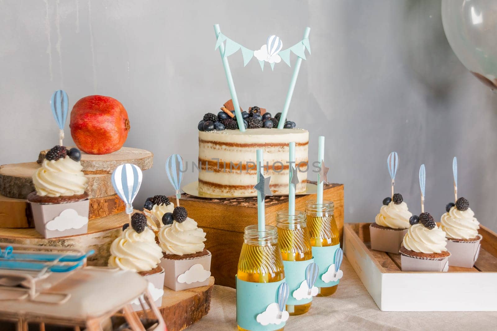 Buffet with sweets. Sweet, colorful cupcakes. Sweet table for banquets, weddings, parties Candy bar