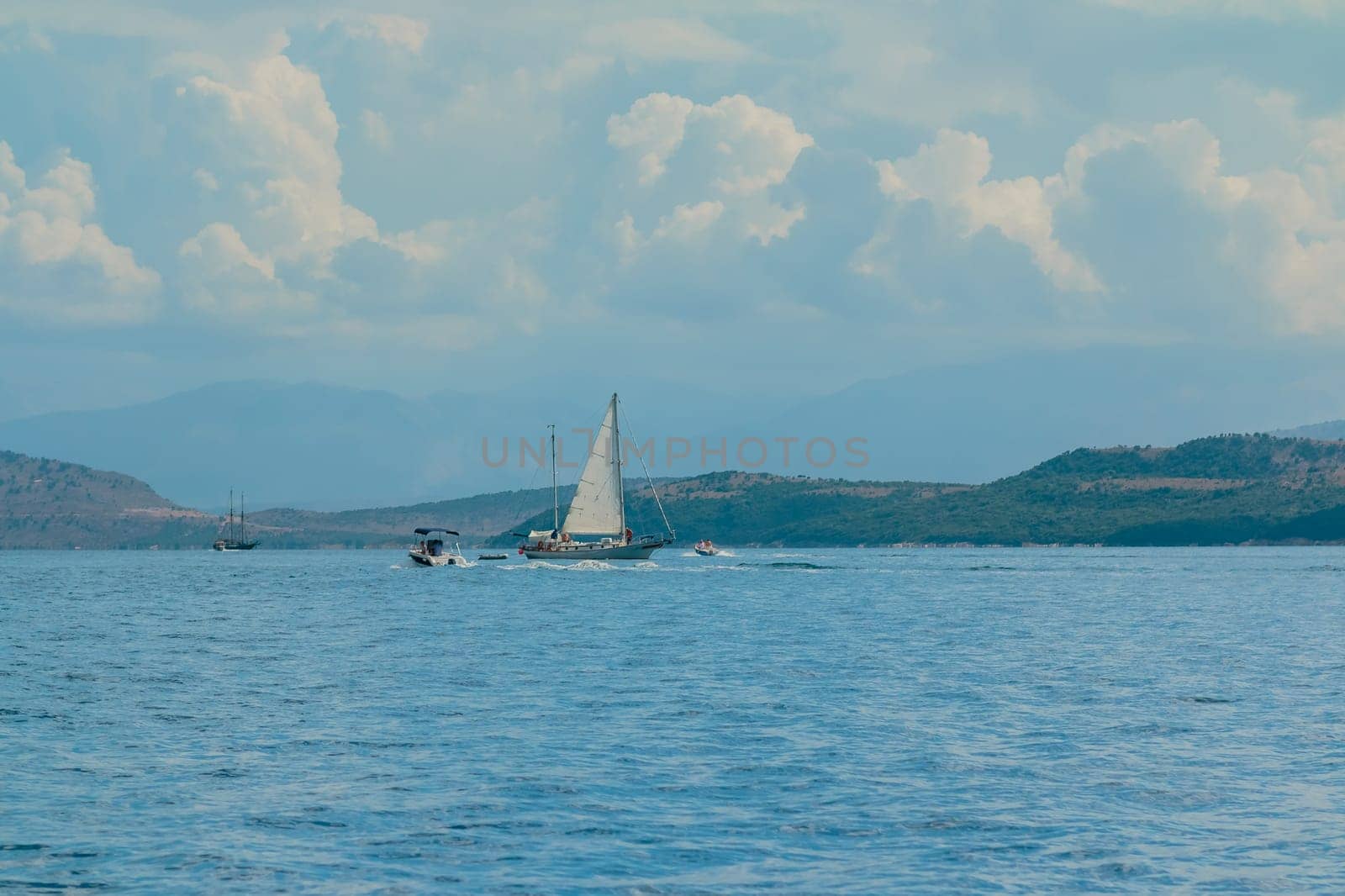 Mediterranean Sea Scene. Magnificent white yachts. Summer vacation