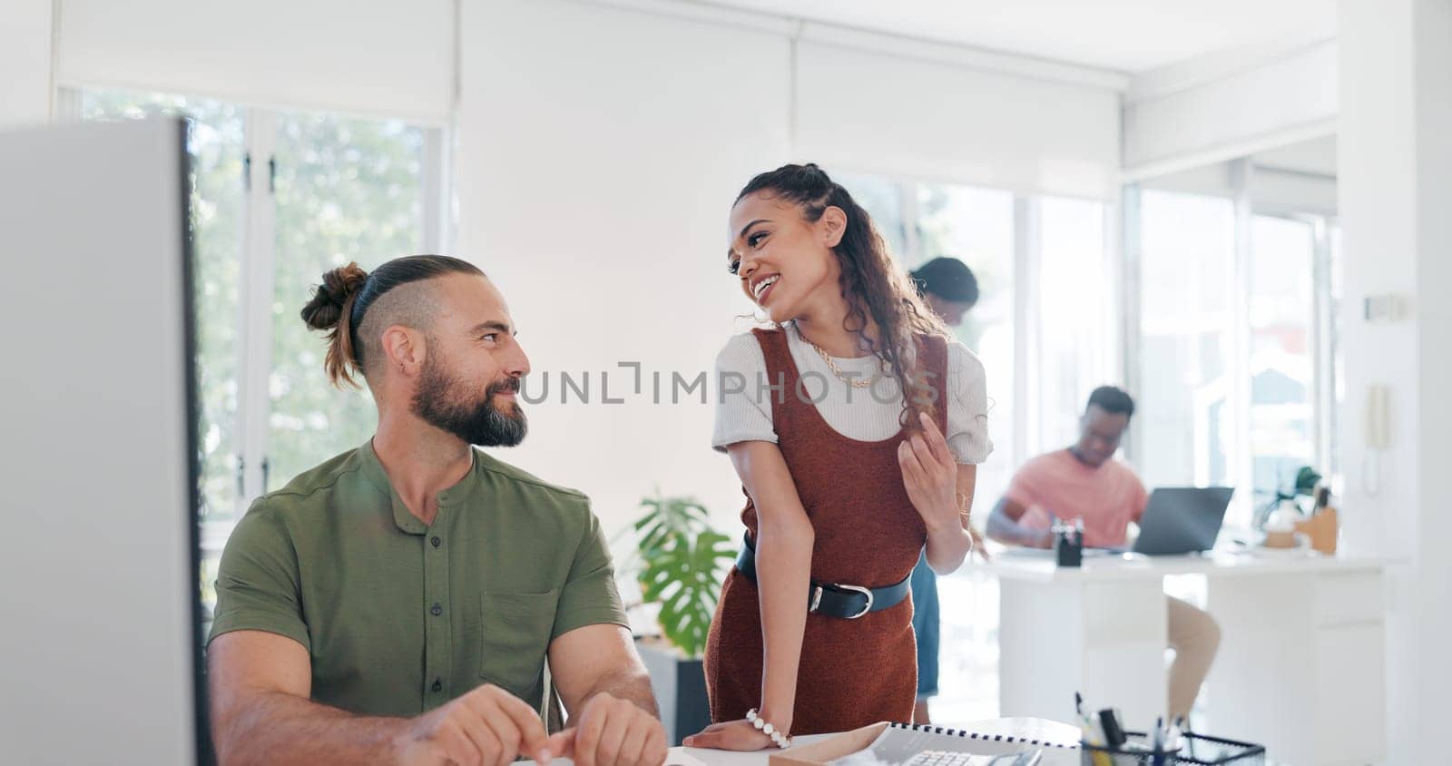 Flirting, laughing and talking business people at work, funny conversation and happiness in an office. Comic, communication and smiling woman being flirtatious with a man while working together by YuriArcurs