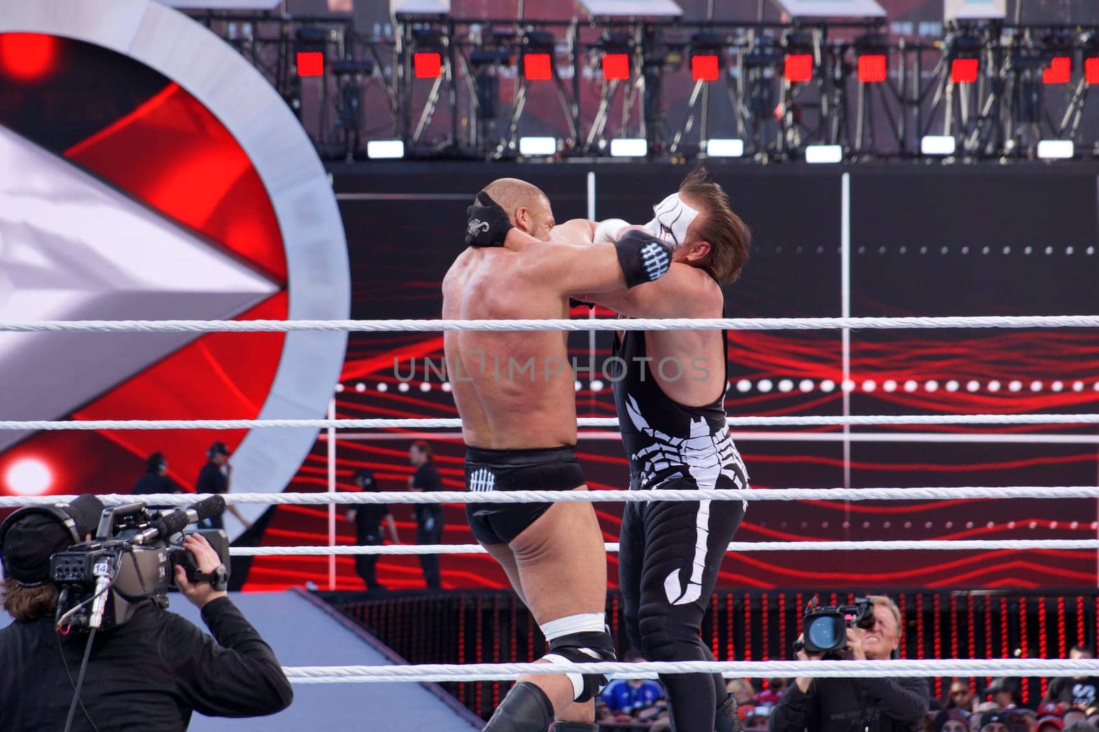 Santa Clara, California - March 29, 2015:  At Wrestlemania 31, at Levi's Stadium, Triple H and Sting engaged in a lock-up during their match in the ring.