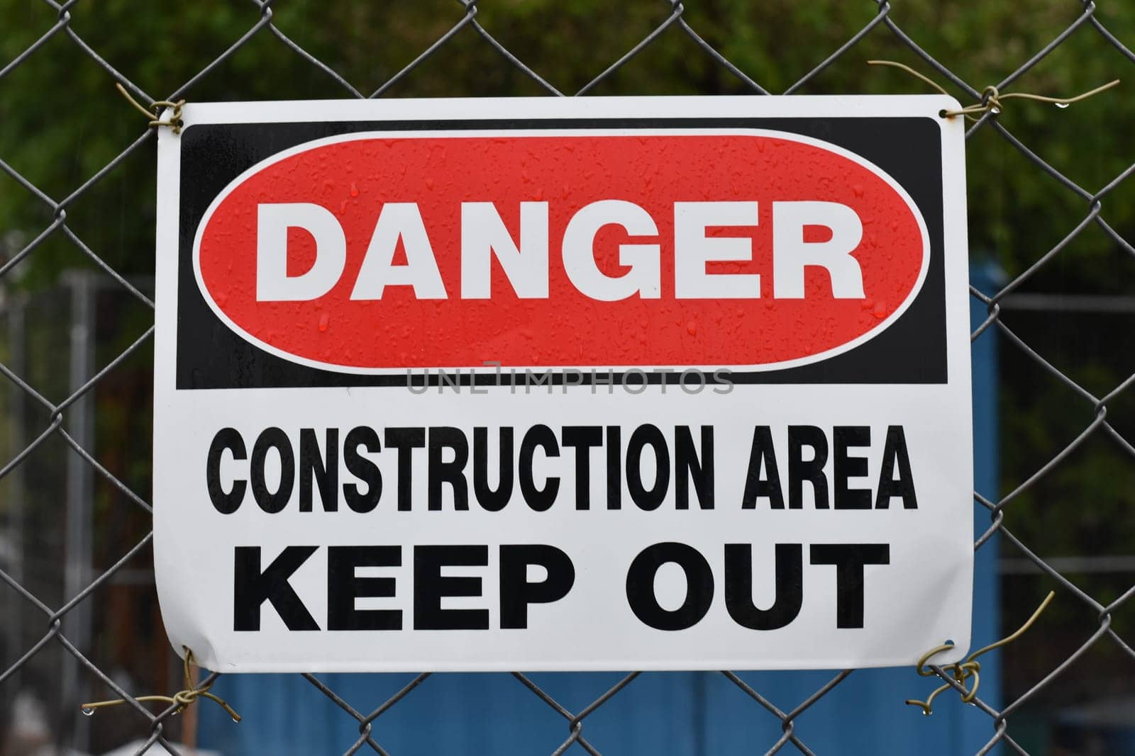 Danger Construction Area Keep Out Sign on Fence. High quality photo