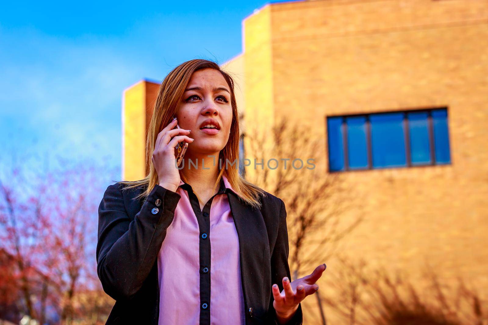 Modern portrait of a young professional business woman.