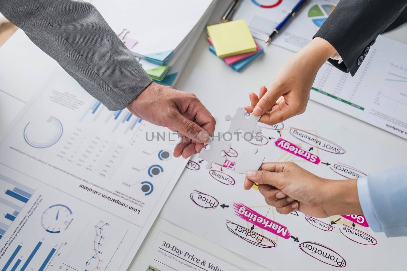 Business handshake for teamwork of business merger and acquisition,successful negotiate,hand shake,two businessman shake hand with partner to celebration partnership and business deal concept. by wichayada