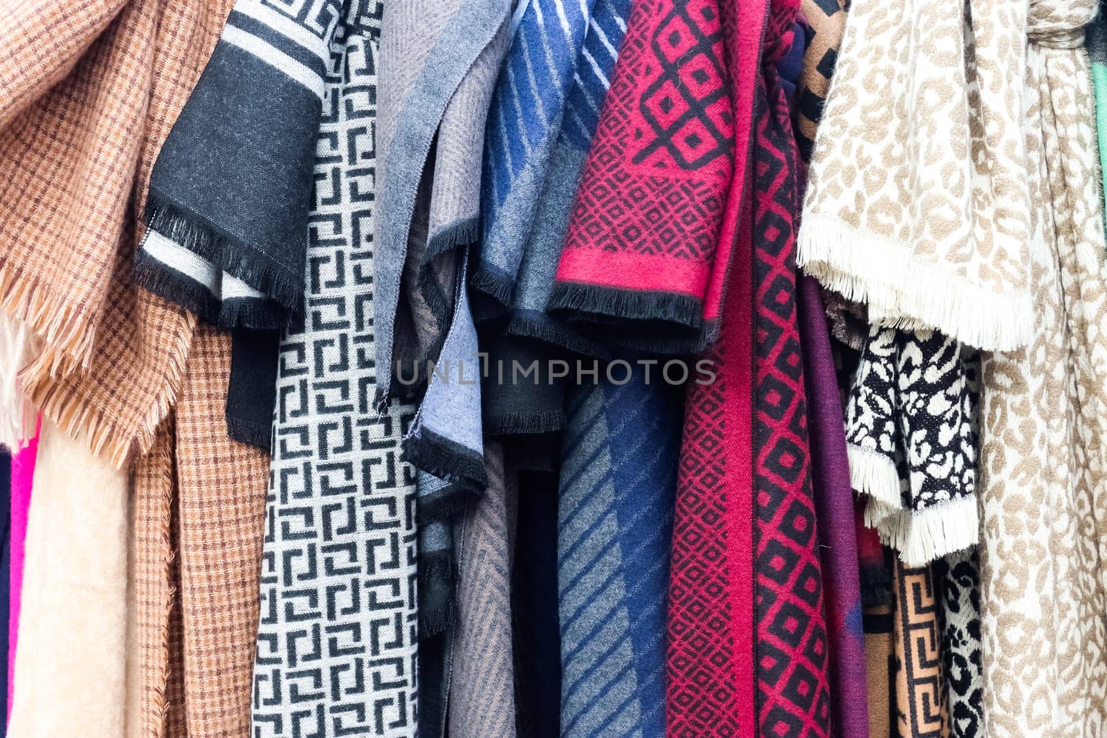 View on samples of cloth and fabrics in different colors found at a german fabrics market. by MP_foto71